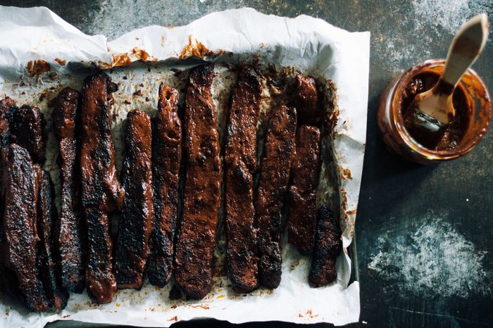 Vegan barbecue ribs in moody lighting. Vegan meat but can be used for vegan food and non vegan food