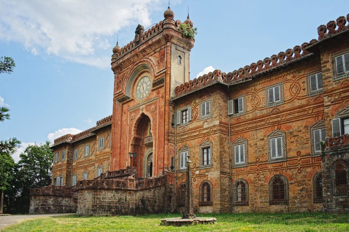 Main entrance with clock of Sammezzano castle in Tuscany