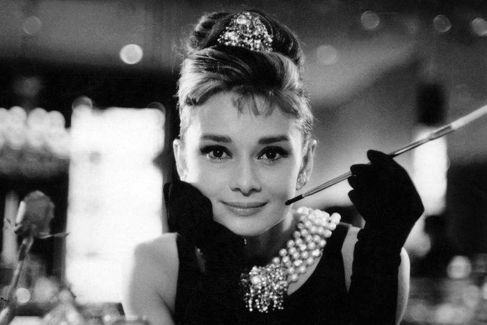 Editorial use only. No book cover usage. Mandatory Credit: Photo by Howell Conant/Paramount/Kobal/Shutterstock (5886249bh) Audrey Hepburn Breakfast At Tiffany's - 1961 Director: Blake Edwards Paramount USA Film Portrait Comedy Breakfast At Tiffanys Diamants sur canapé