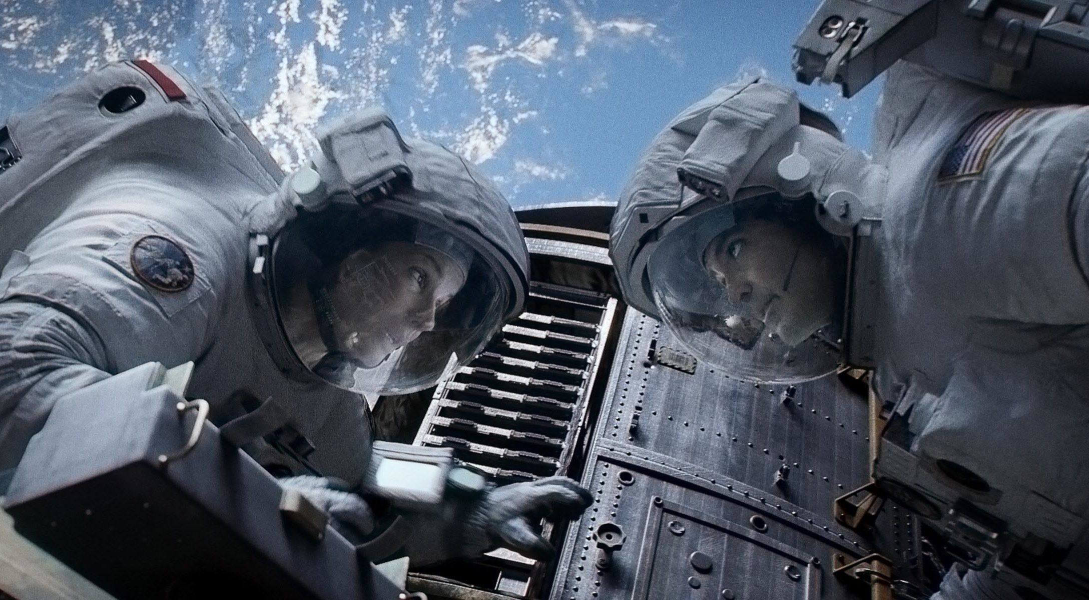 Editorial use only. No book cover usage. Mandatory Credit: Photo by Warner Bros/Kobal/Shutterstock (5885513ae) Sandra Bullock, George Clooney Gravity - 2013 Director: Alfonso Cuaron Warner Bros USA Scene Still