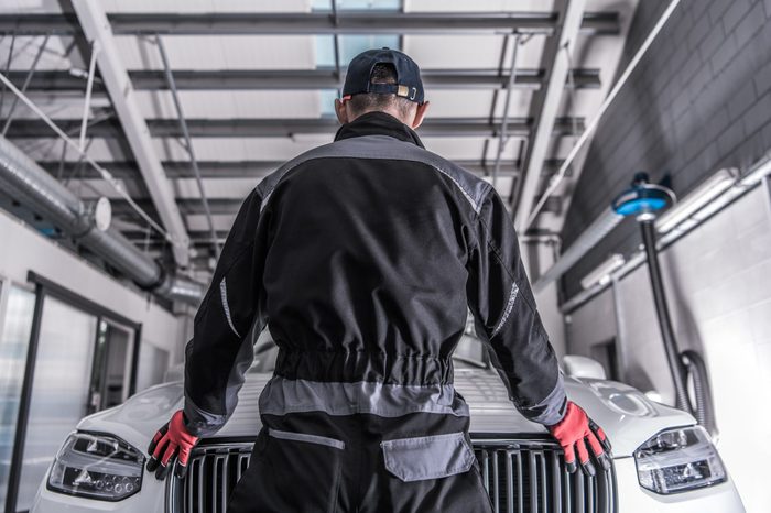 Car Mechanic Challenge. Caucasian Auto Service Worker Preparing For Challenging Work To Fix Broken Vehicle.