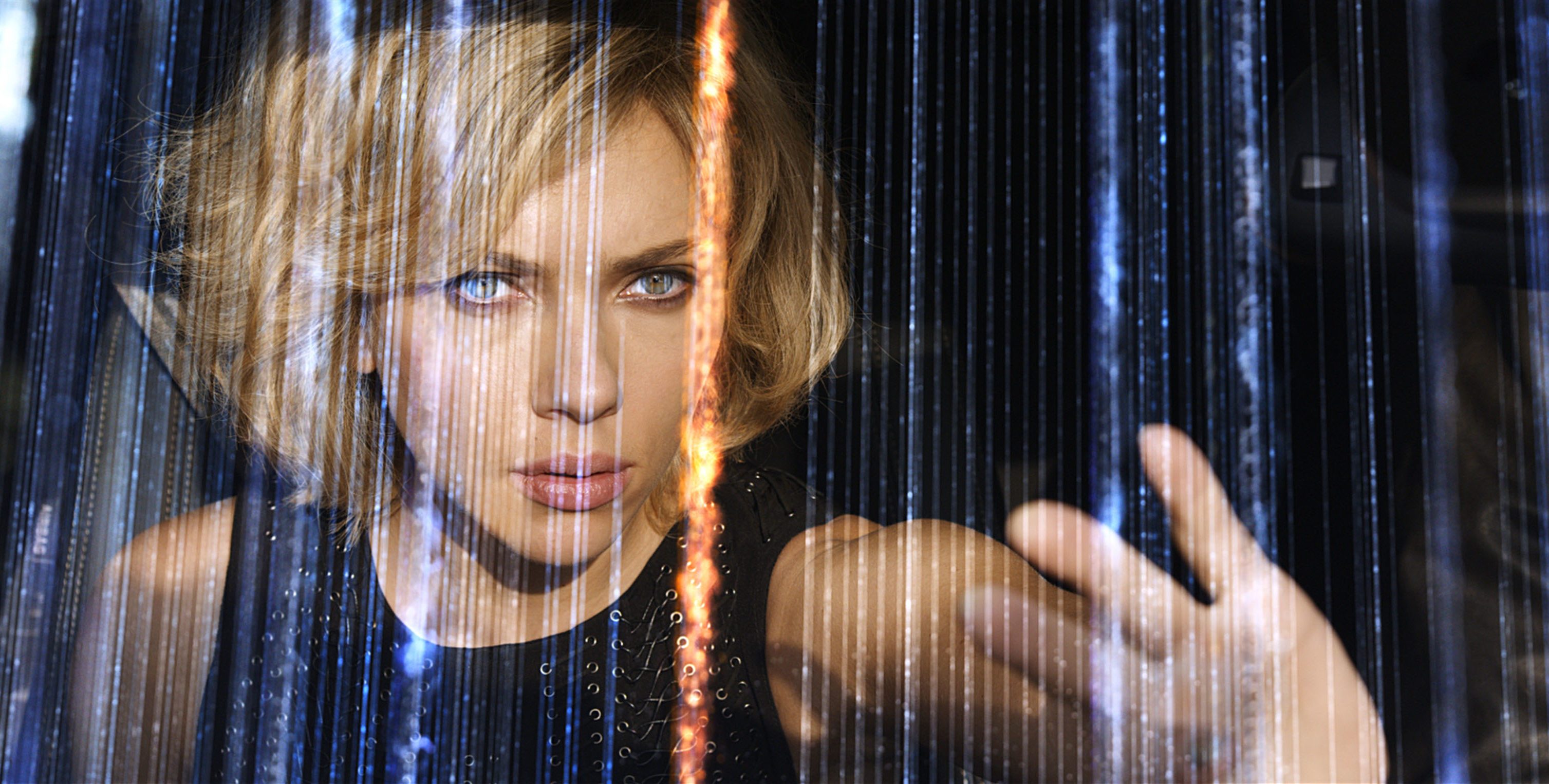 Editorial use only. No book cover usage. Mandatory Credit: Photo by Canal+/Universal/Kobal/Shutterstock (5882439o) Scarlett Johansson Lucy - 2014 Director: Luc Besson Canal+/Tf1 Films/Universal FRANCE/USA Scene Still Action/Adventure