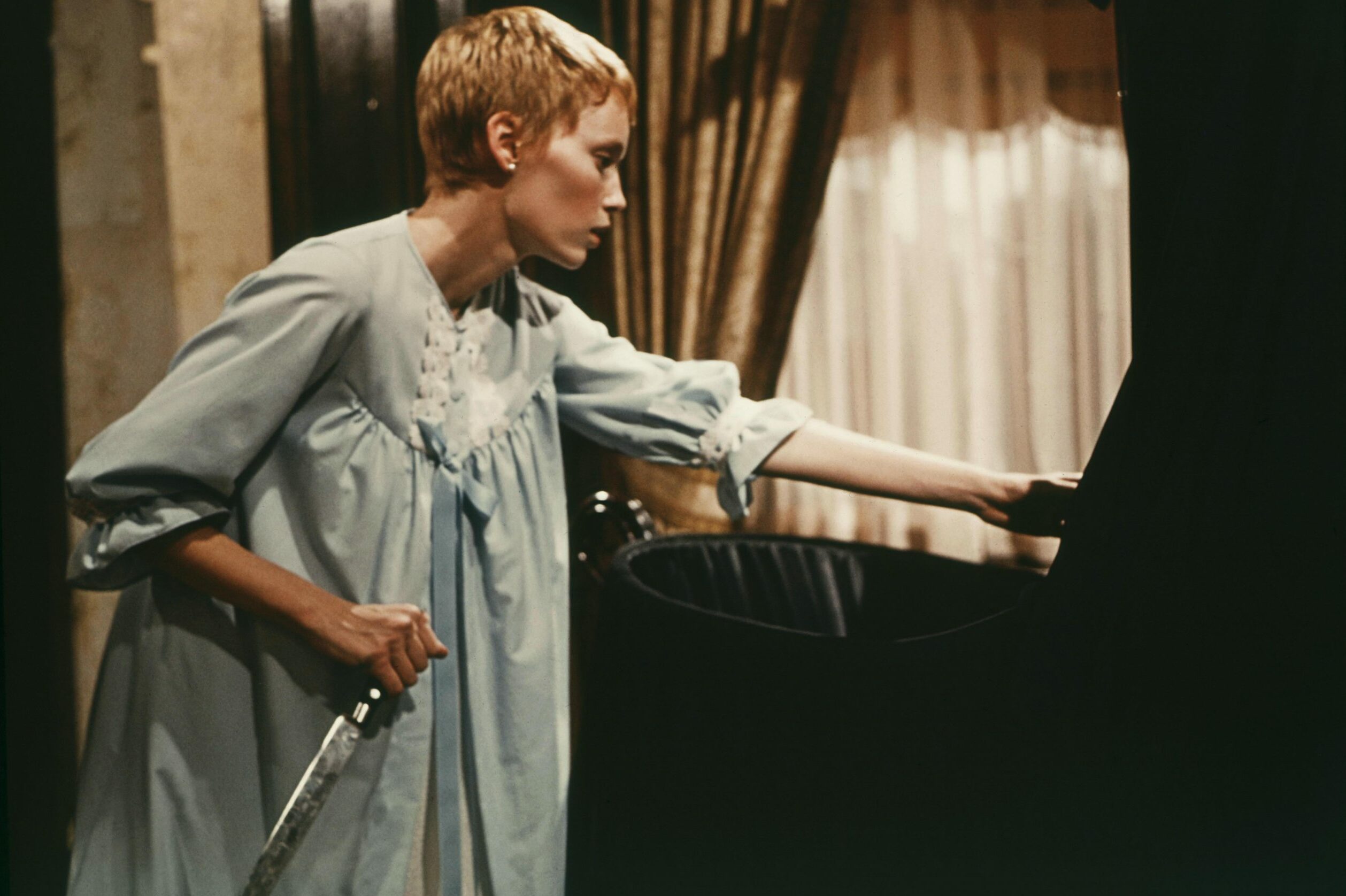 Editorial use only. No book cover usage. Mandatory Credit: Photo by Paramount/Kobal/Shutterstock (5885523r) Mia Farrow Rosemary's Baby - 1968 Director: Roman Polanski Paramount USA Scene Still Horror