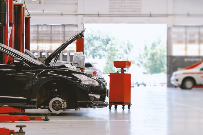 car repair station with soft-focus and over light in the background