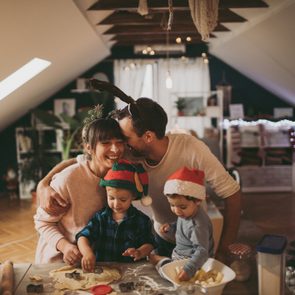 family having fun making christmas cookies