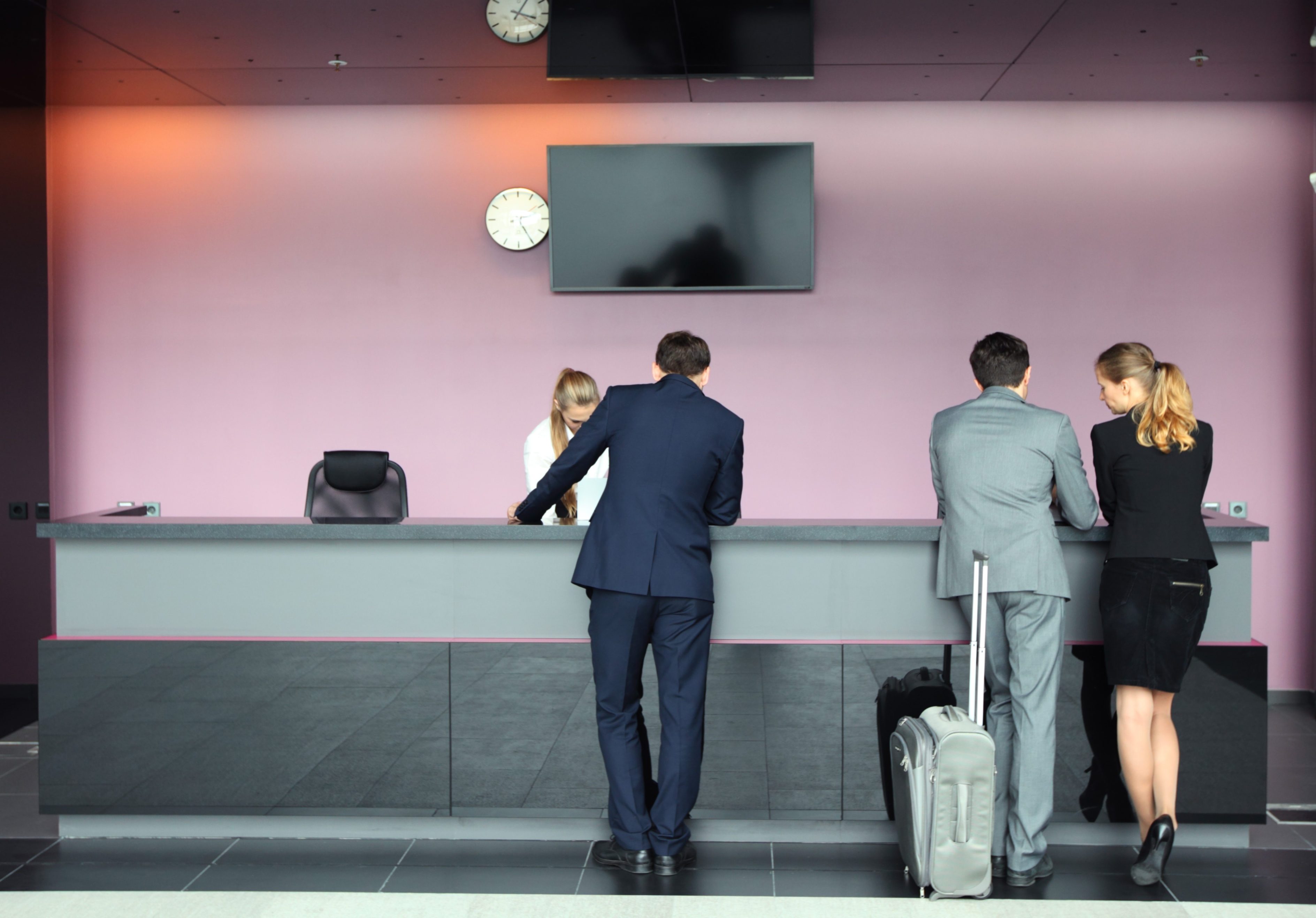 Business people passengers with suitcase waiting for check-in at airport