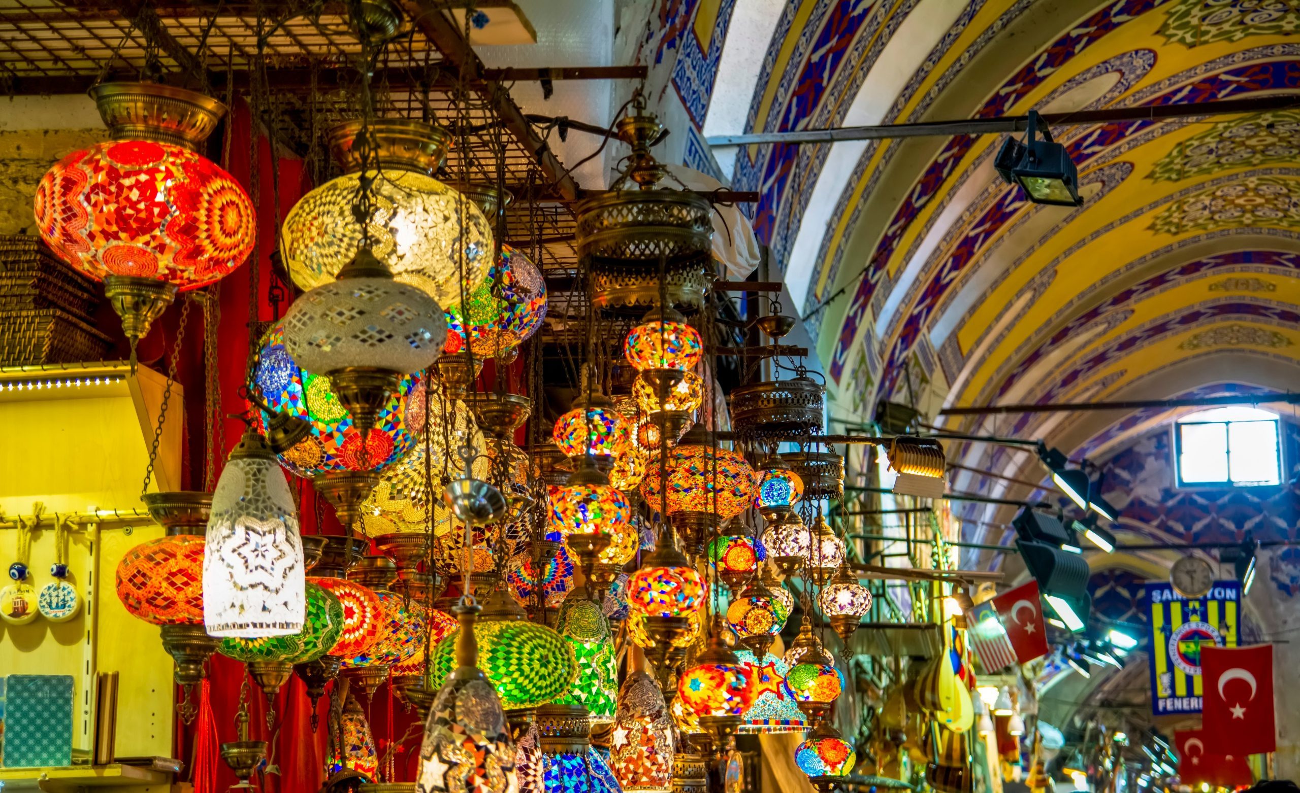 Among countless shops in Grand Bazaar market in Istanbul. Shopping and travel in Turkey concept