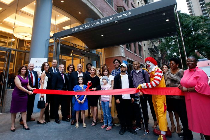 Tina Lundgren, Ruth C. Browne. Ronald McDonald House New York Chair of the Board Tina Lundgren, holding scissors, and CEO Dr. Ruth C. Browne, behind to the right, are joined by children, staff and board members of the House during the Ronald McDonald House New York Grand Re-Opening following the facility's $23.6 million renovation, in New York 18 Sep 2017