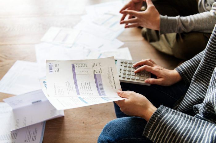 Couple managing the debt