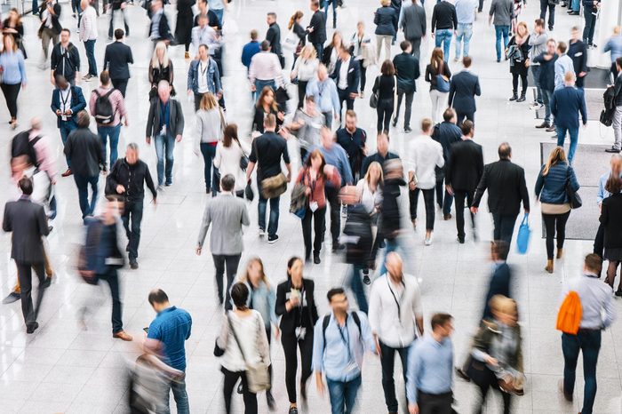 crowd of people with motion blur