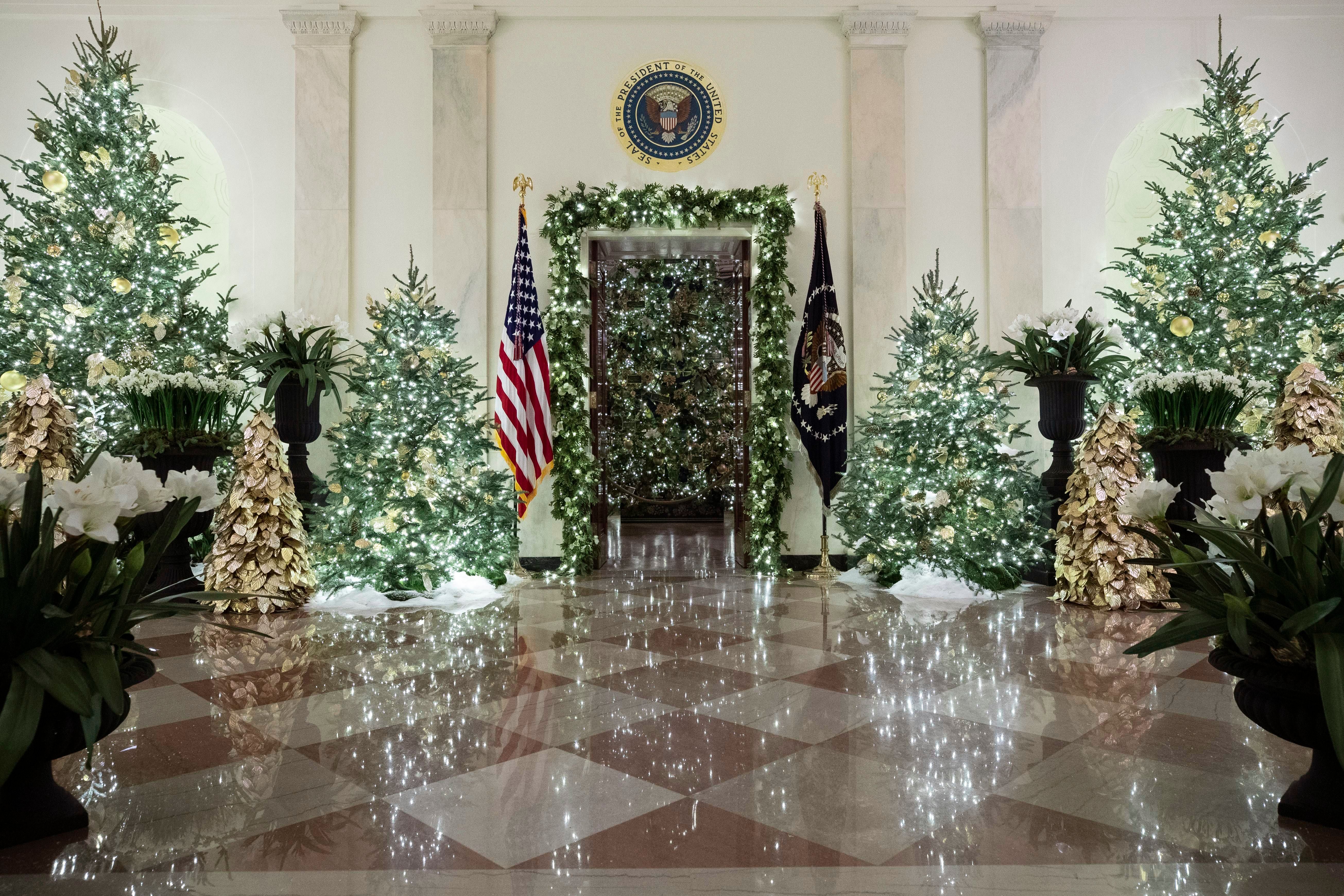 Mandatory Credit: Photo by Alex Brandon/AP/Shutterstock (10489702p) The official White House Christmas tree is decorated in the Blue Room seen through the Cross Hall, during the 2019 Christmas preview at the White House, in Washington White House Christmas, Washington, USA - 02 Dec 2019