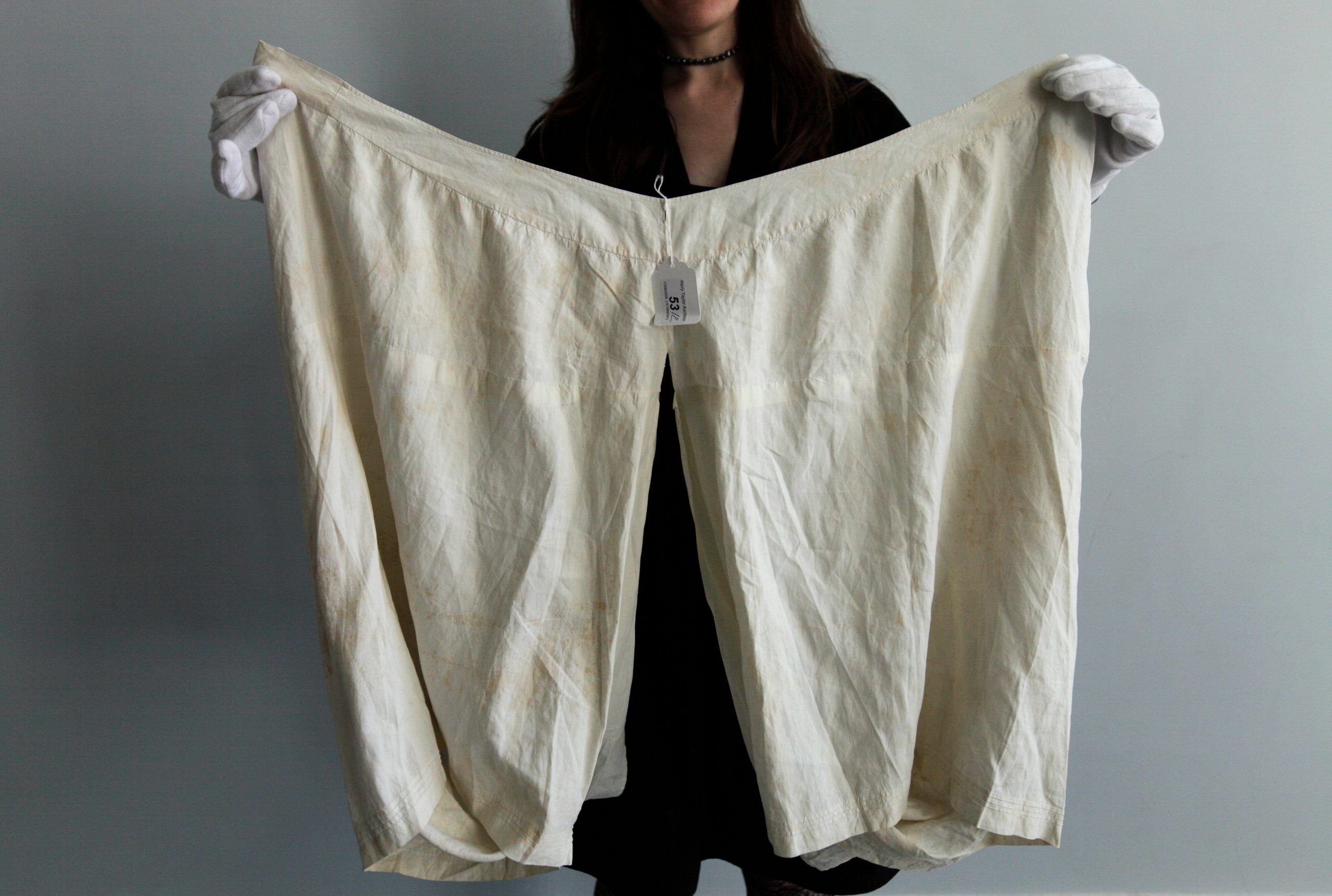 Mandatory Credit: Photo by Lefteris Pitarakis/AP/Shutterstock (7039790b) Alexandra Kim, curator of the Royal Ceremonial Dress Collection, holds a pair of bloomers which once belonged to Britain's Queen Victoria, as she poses for the photographer at Kensington Palace, in central London, . The underwear, which has a 56-inch (142-centimeter) waist, has been added to Britain's Royal Ceremonial Dress Collection at Kensington Palace. It has a matching chemise, is embroidered with a "VR" and is believed to date from the 1890s BRITAIN VICTORIAS BLOOMERS, LONDON, Gbr Xen