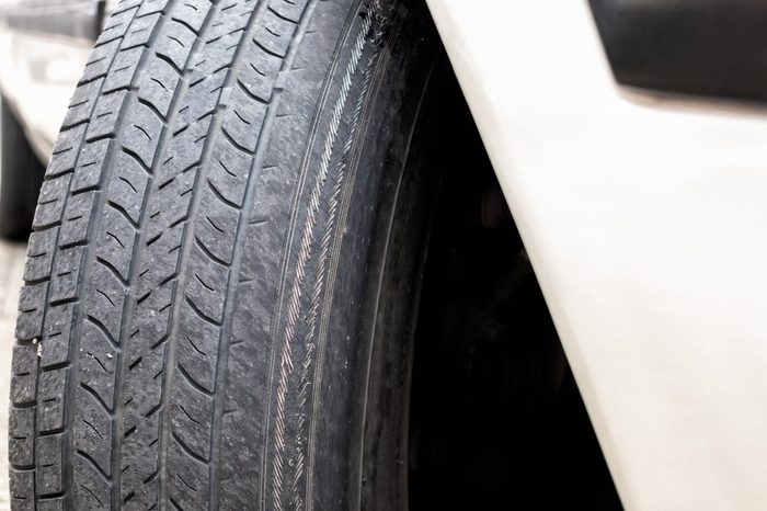 Exposed Metal Wire Cords on badly Worn Tire