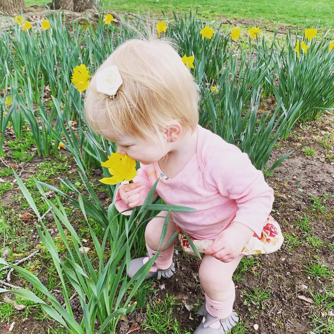 little girl tulips spring