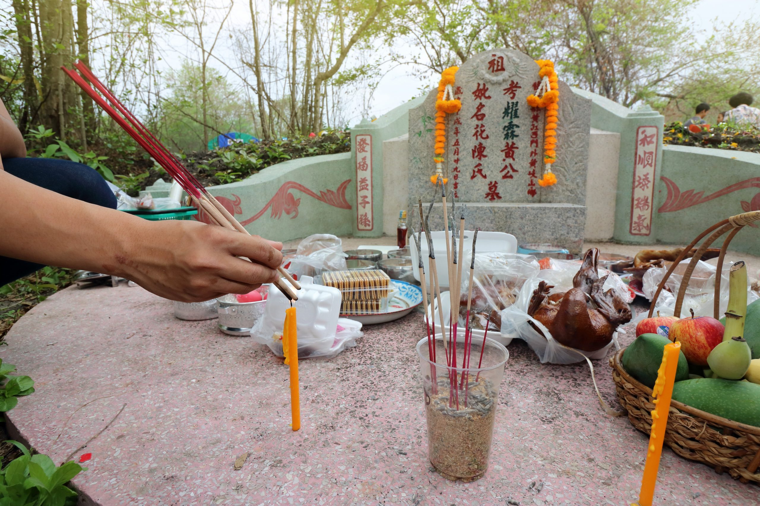 Qingming Festival China, Thai people praying Ancestor Worshipping with Sacrificial offering in the Qingming Festival at Jing Gung Cemetery