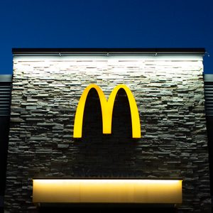 mcdonalds sign on the building at dusk