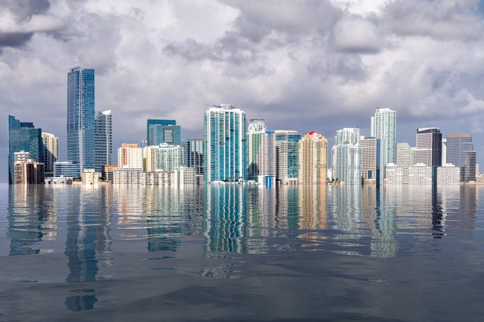 Miami skyline concept of sea level rise and flooding from global warming