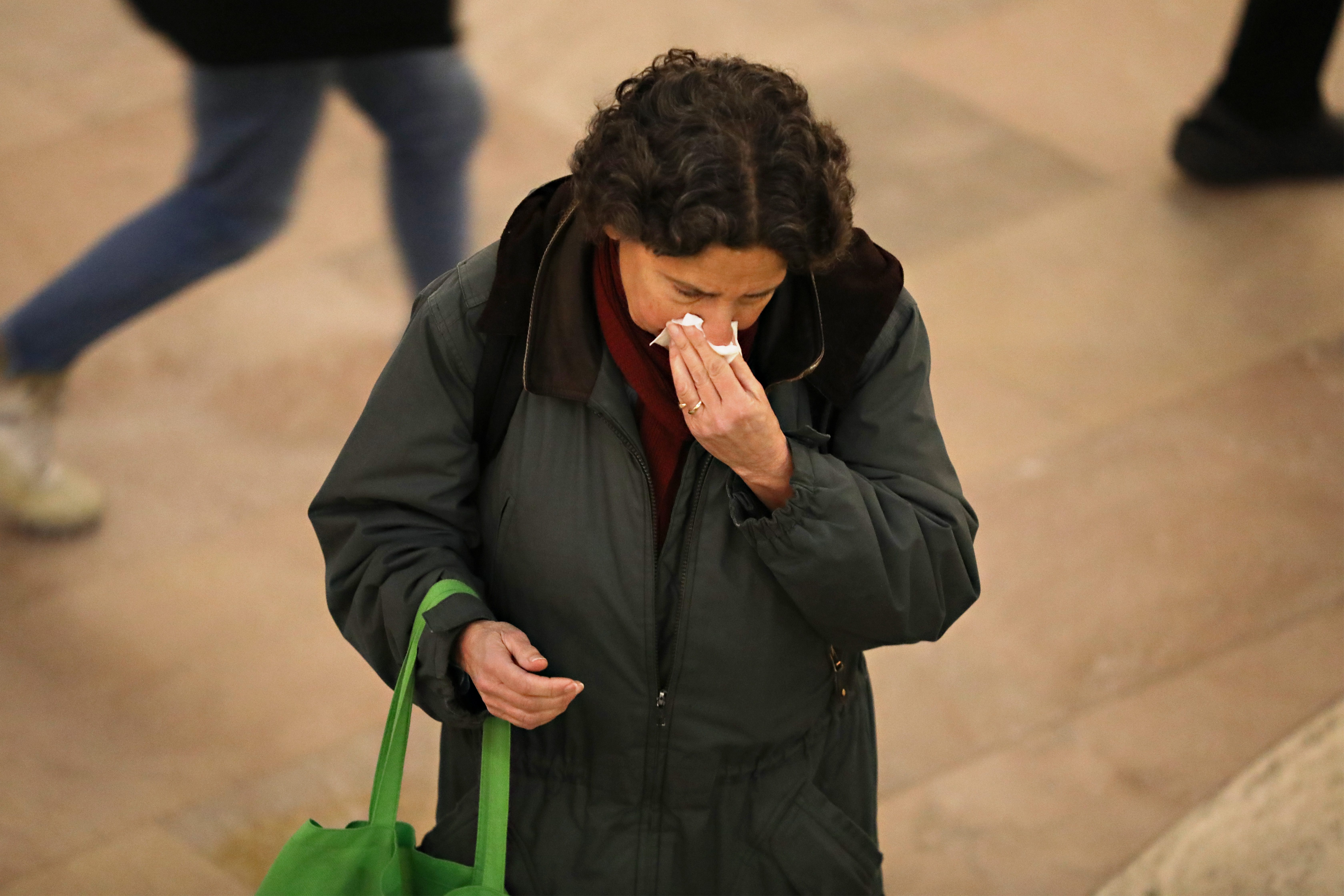 Commuters Navigate Mass Transit During Rush Hour Amid Coronavirus Threat