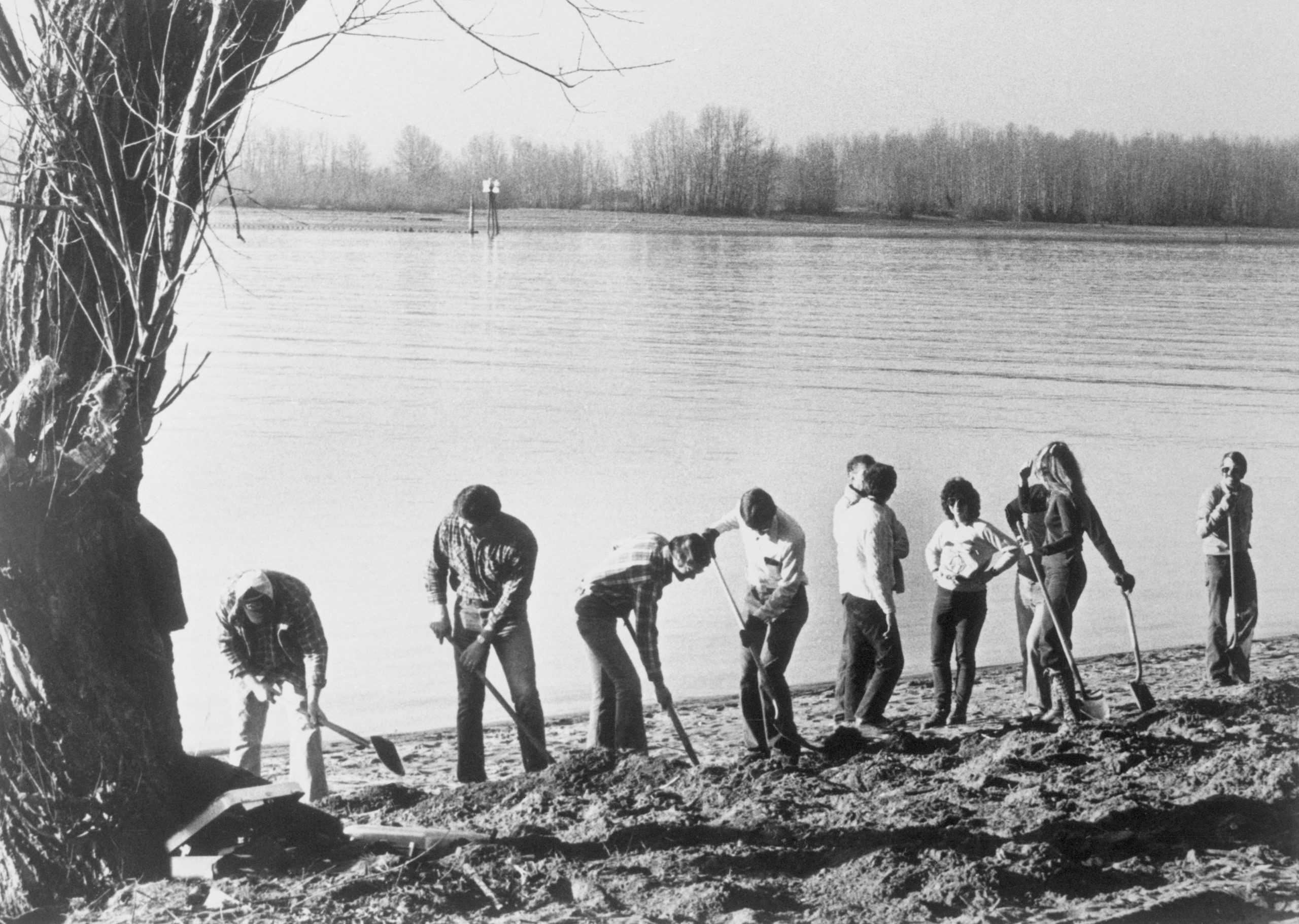 FBI Agents Digging Alongside River