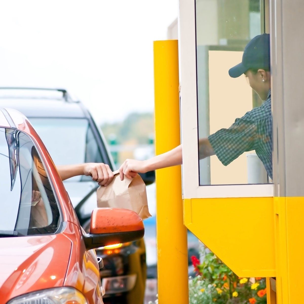 Drive thru fast food restaurant.(motion blur)