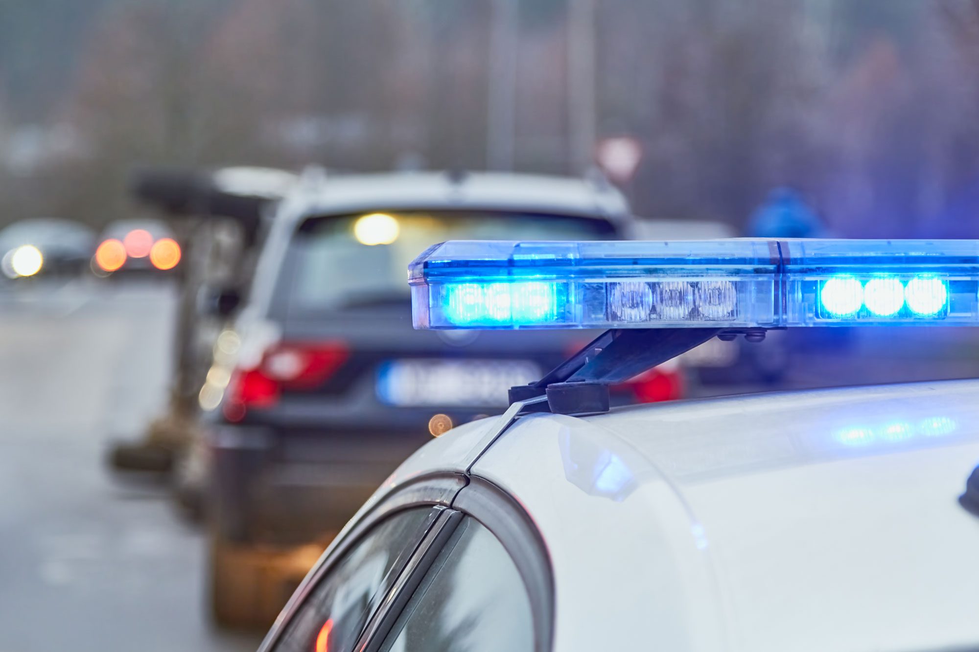 Blue Lights Of A Police Car At The Scene Of An Accident