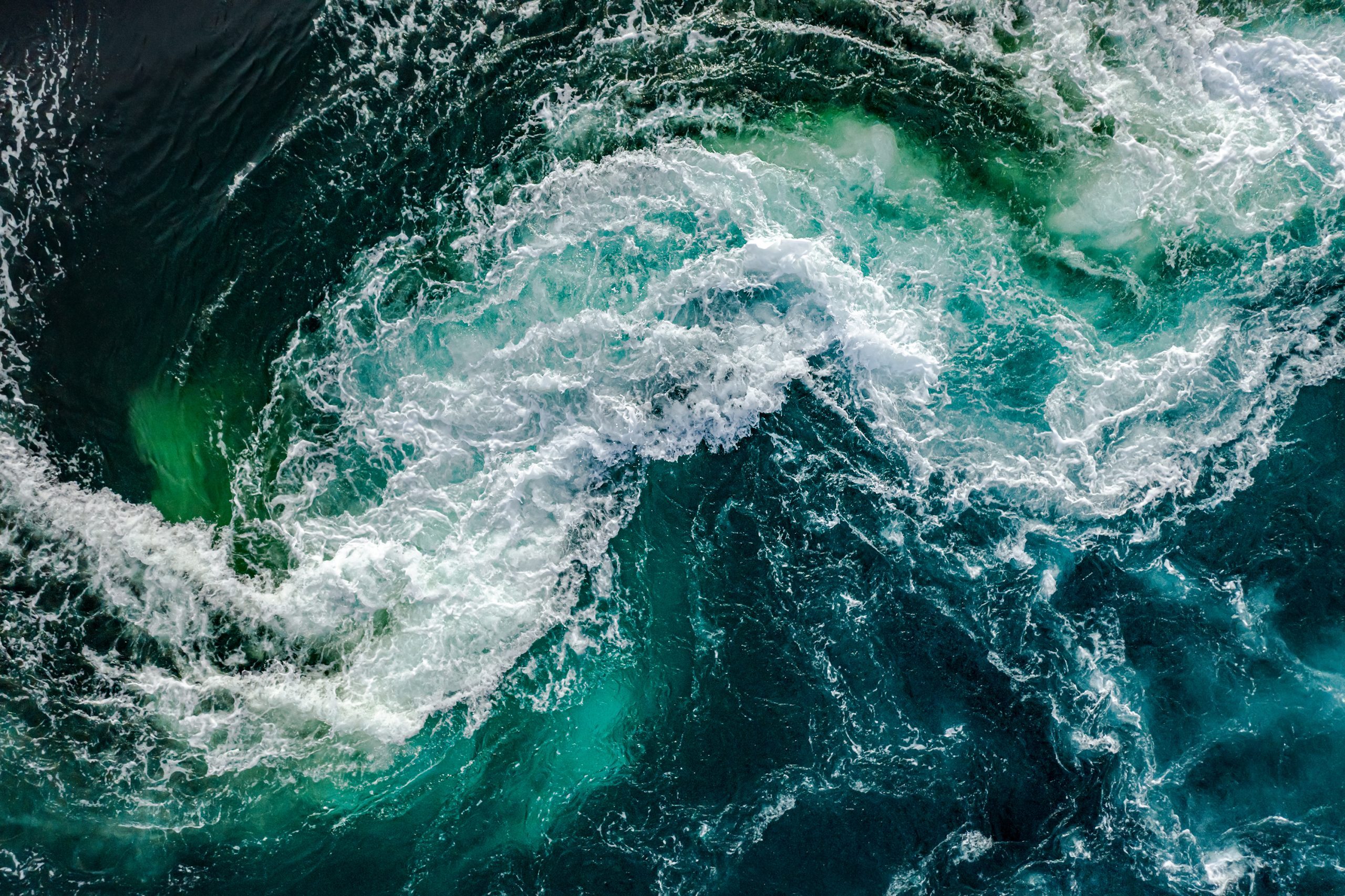 Waves of water of the river and the sea meet each other during high tide and low tide.