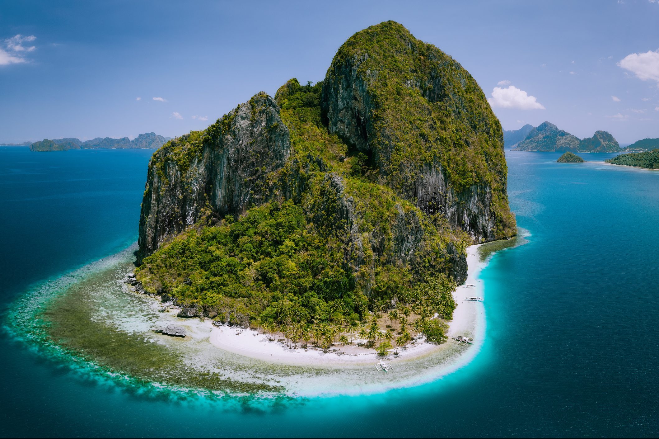 El Nido, Palawan, Philippines. Aerial drone above shot of impressive Pinagbuyutan Island. Amazing white sand Ipil beach with turquoise blue water around