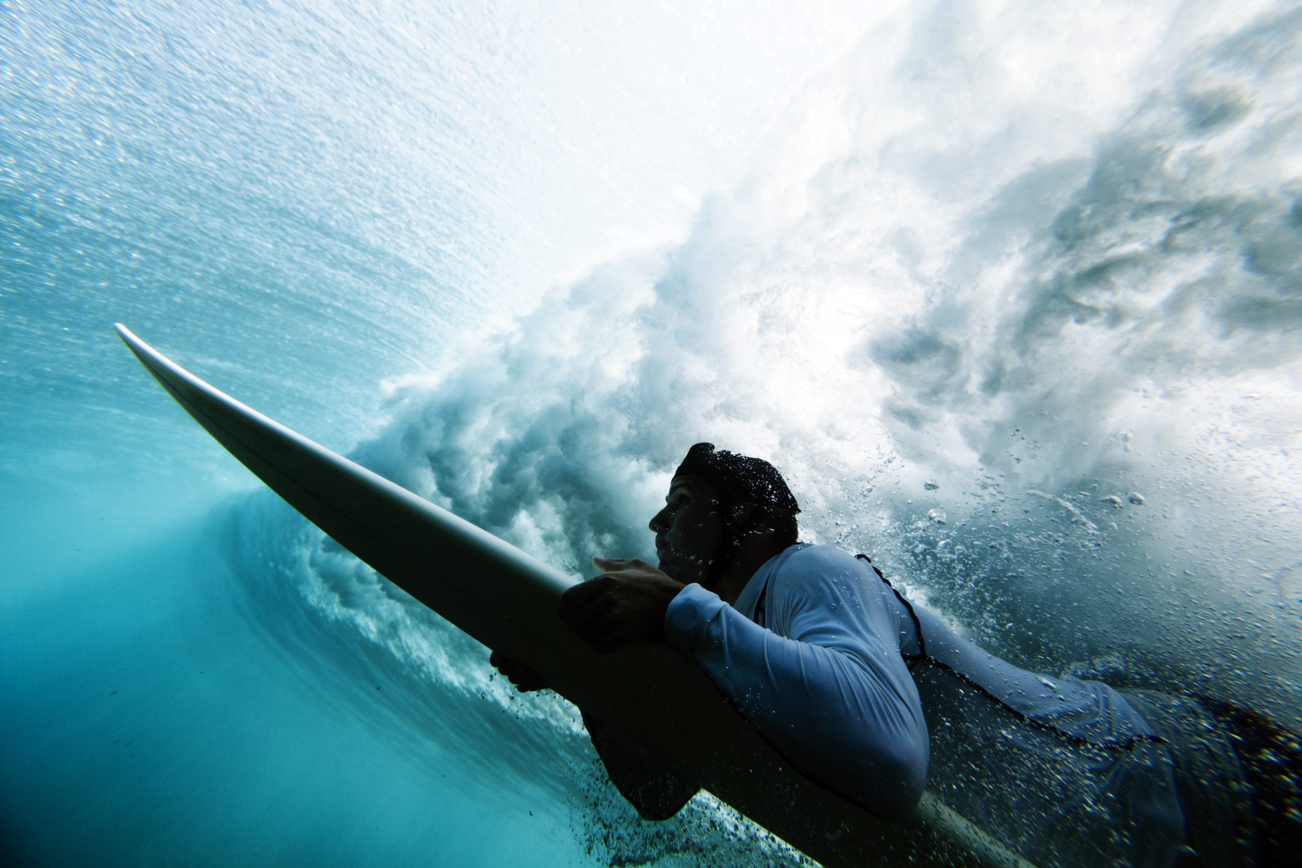 Surfer duck diving