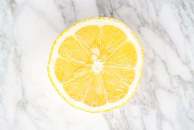 Lemon on gray marble