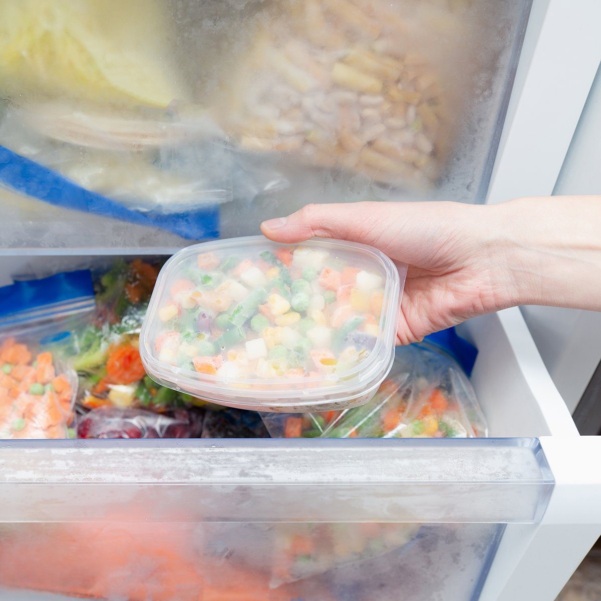 Frozen vegetables in a plastic bag. Healthy food storage concept.