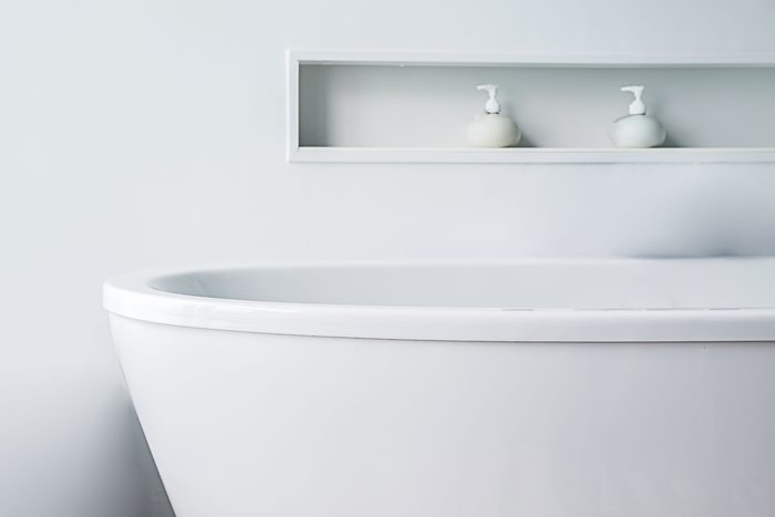 Close-Up Of Bathtub In Bathroom