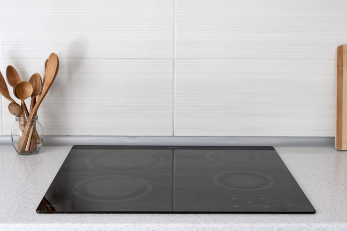 Kitchen with built in ceramic induction stove