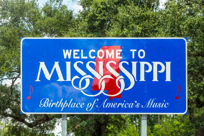 Welcome to Mississippi sign in blue and red