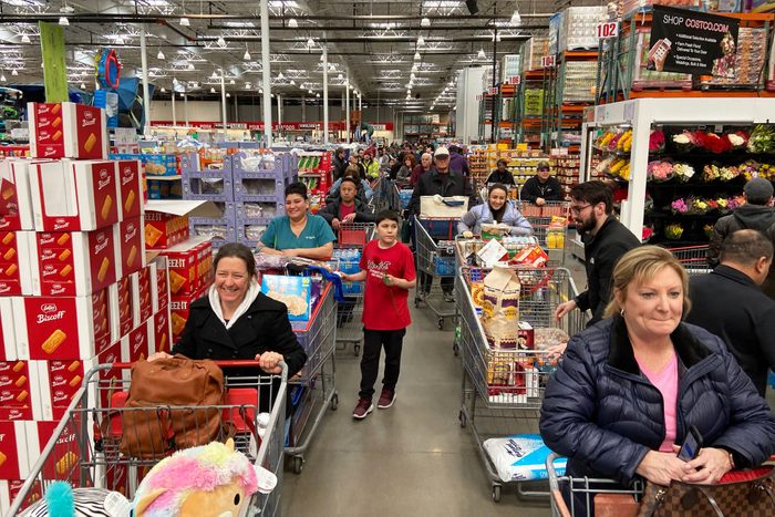 Stores feel the rush of shoppers stocking up in the midst of a pandemic