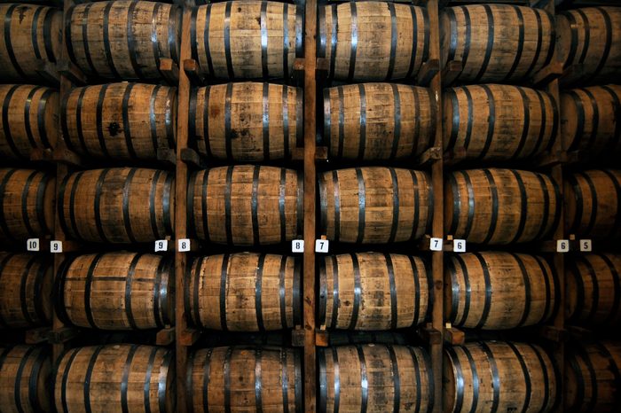 Stack of Wooden Whiskey Barrels