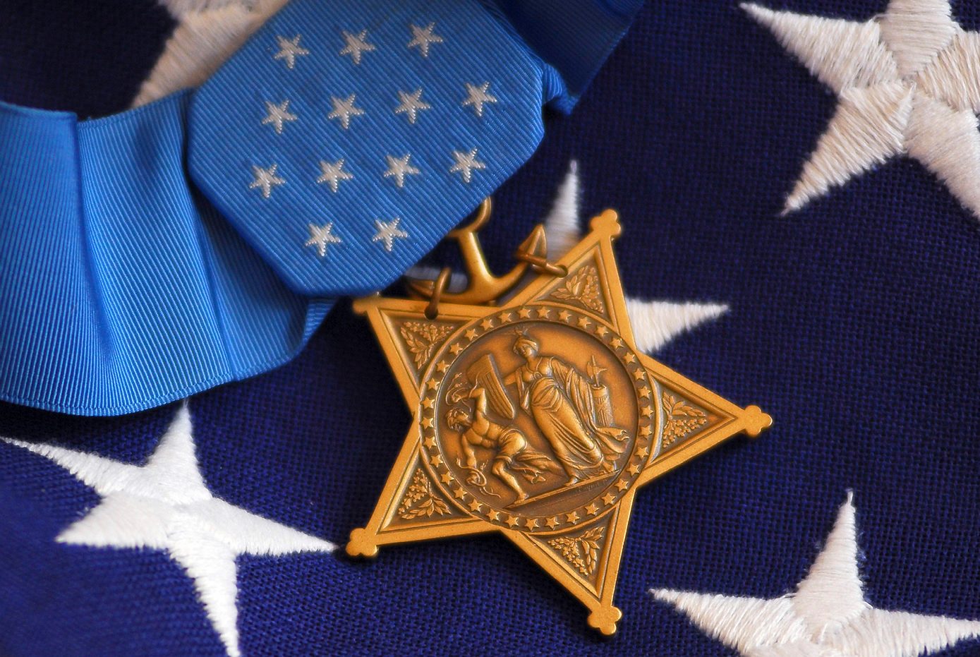 The Medal of Honor rests on a flag during preparations for an award ceremony.