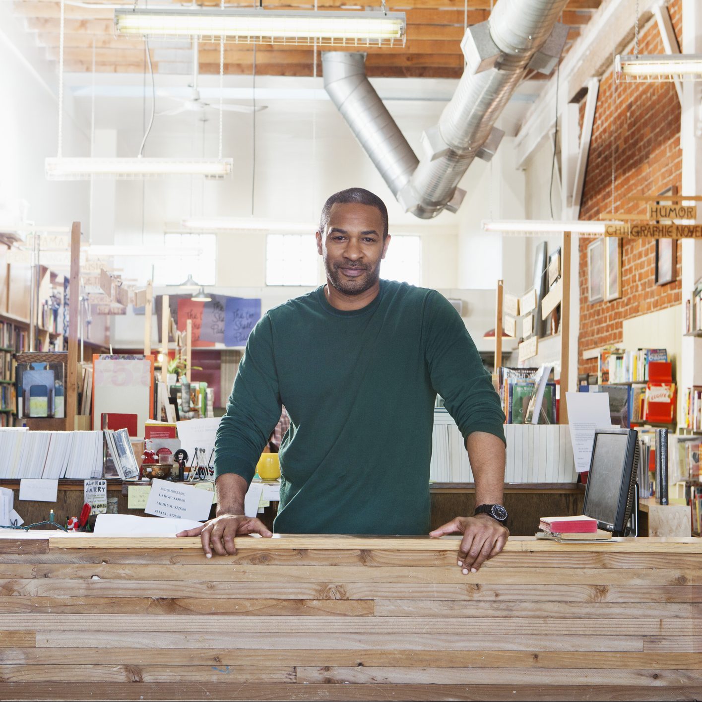 Portrait of man in room full of books