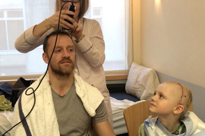 My dad shaved his head for me