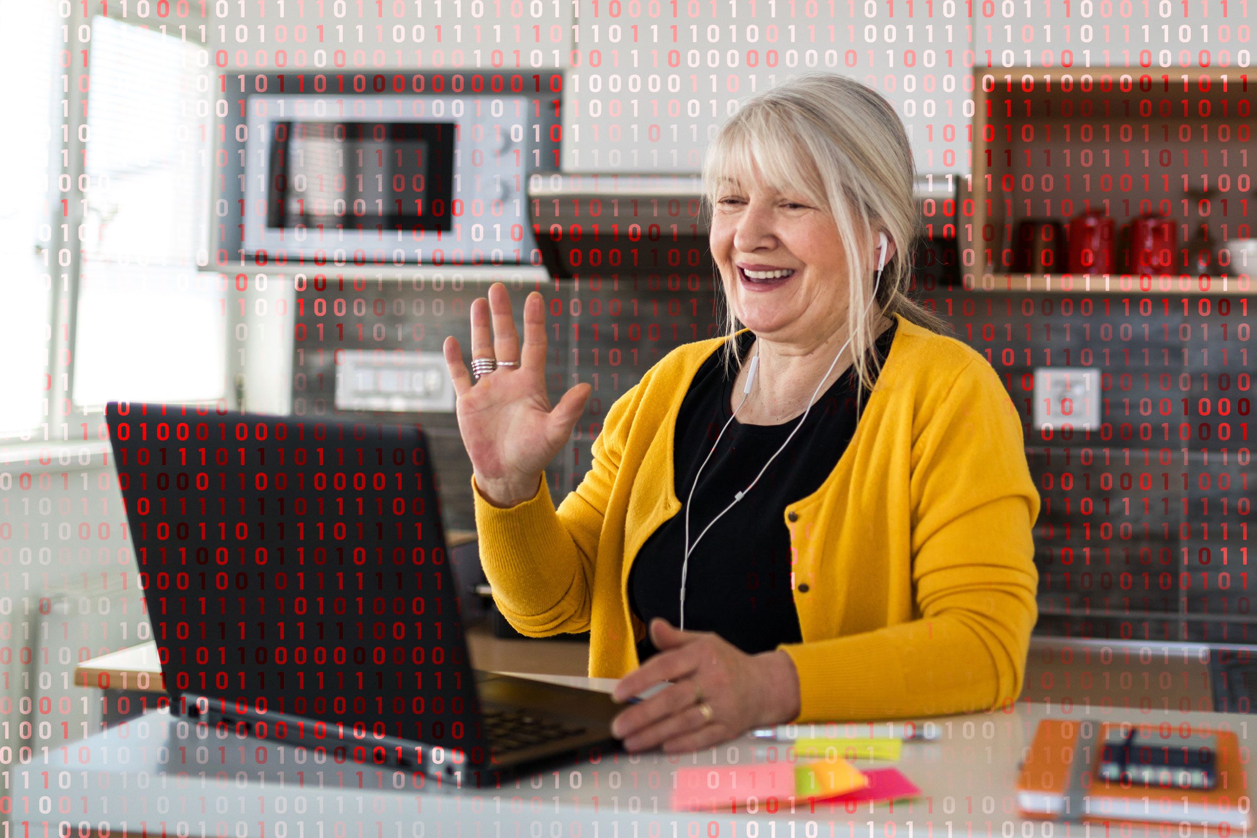 woman using zoom in her kitchen; computer code overlay