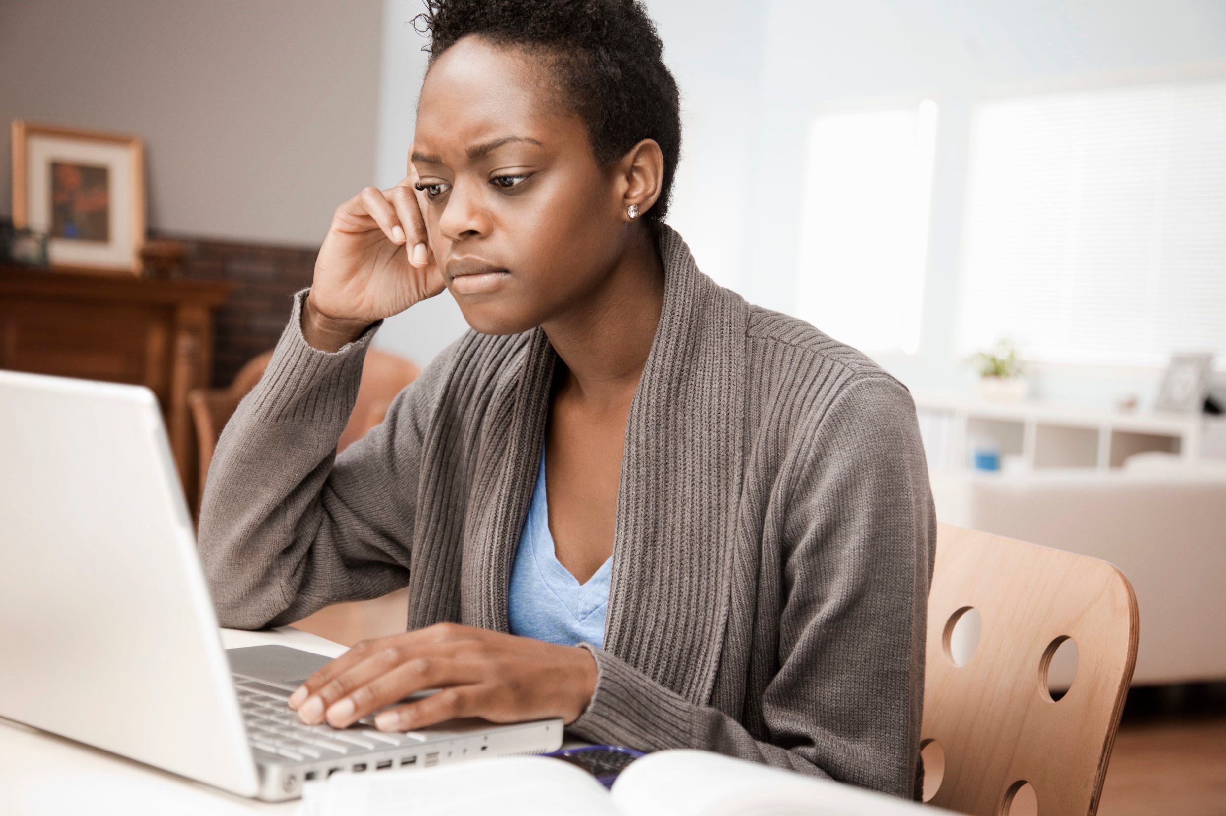 African American woman working in home office