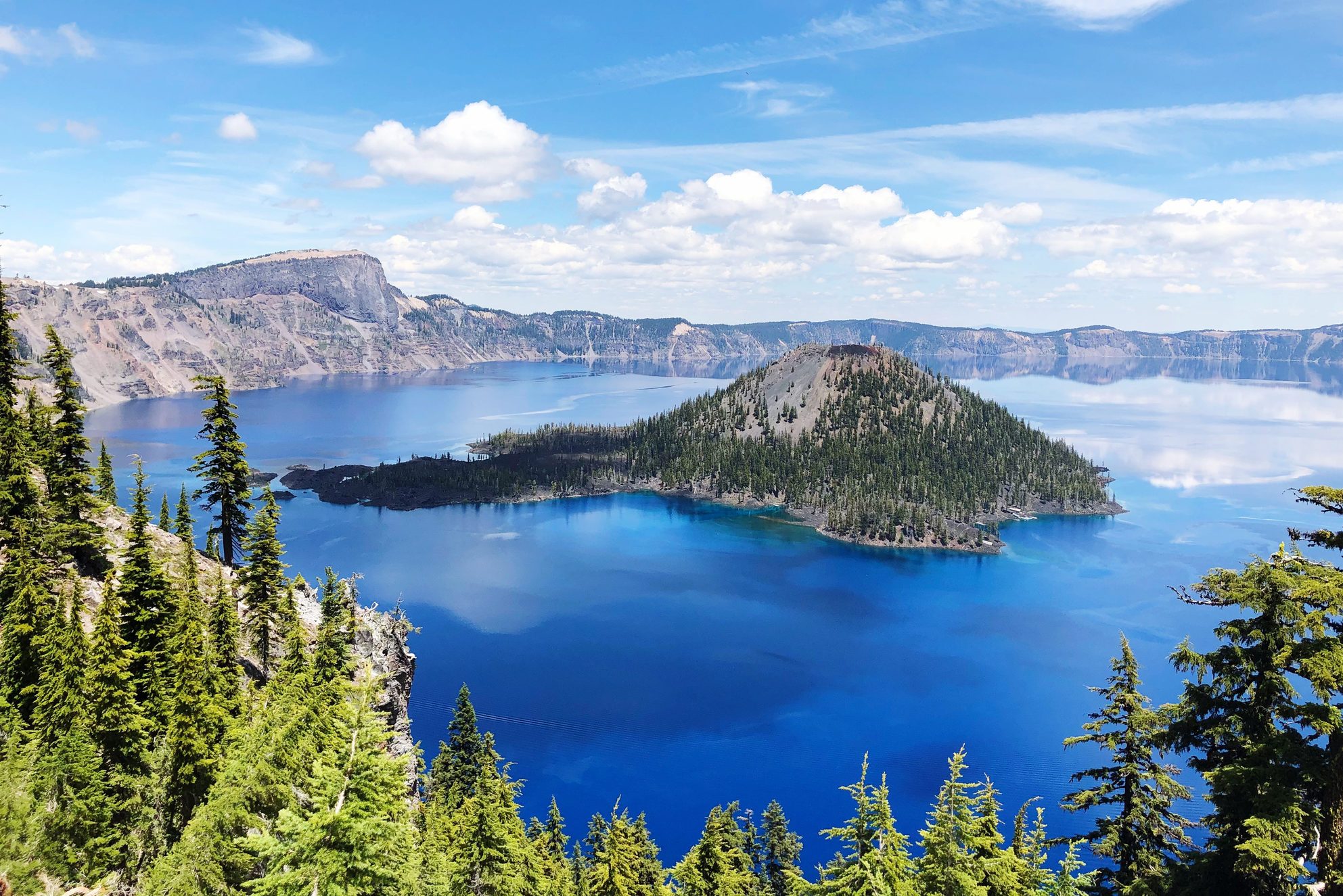 Scenic View Of Lake By Trees Against Sky