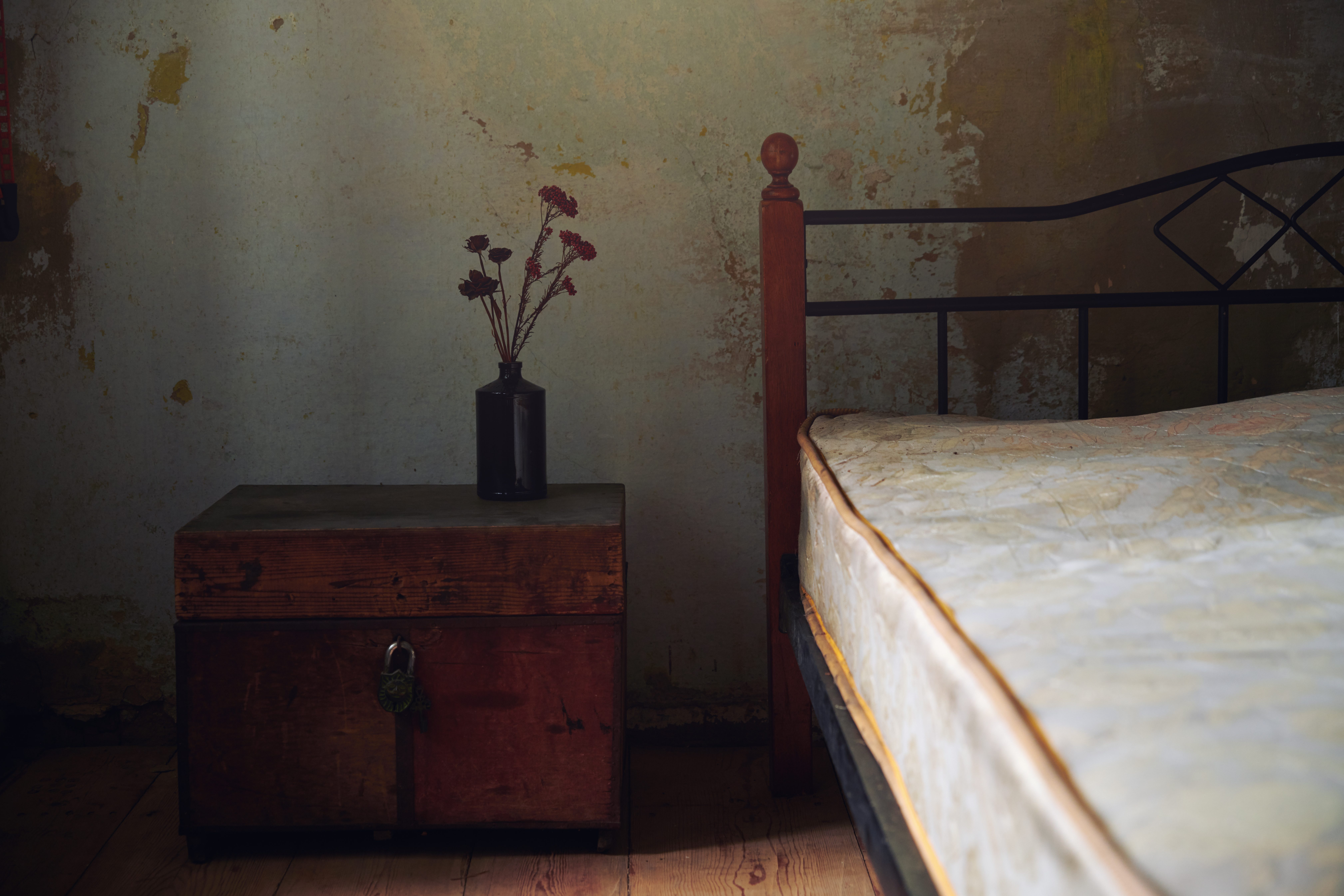 Vintage interior with bed and wooden trunk. Nicely fits for book cover