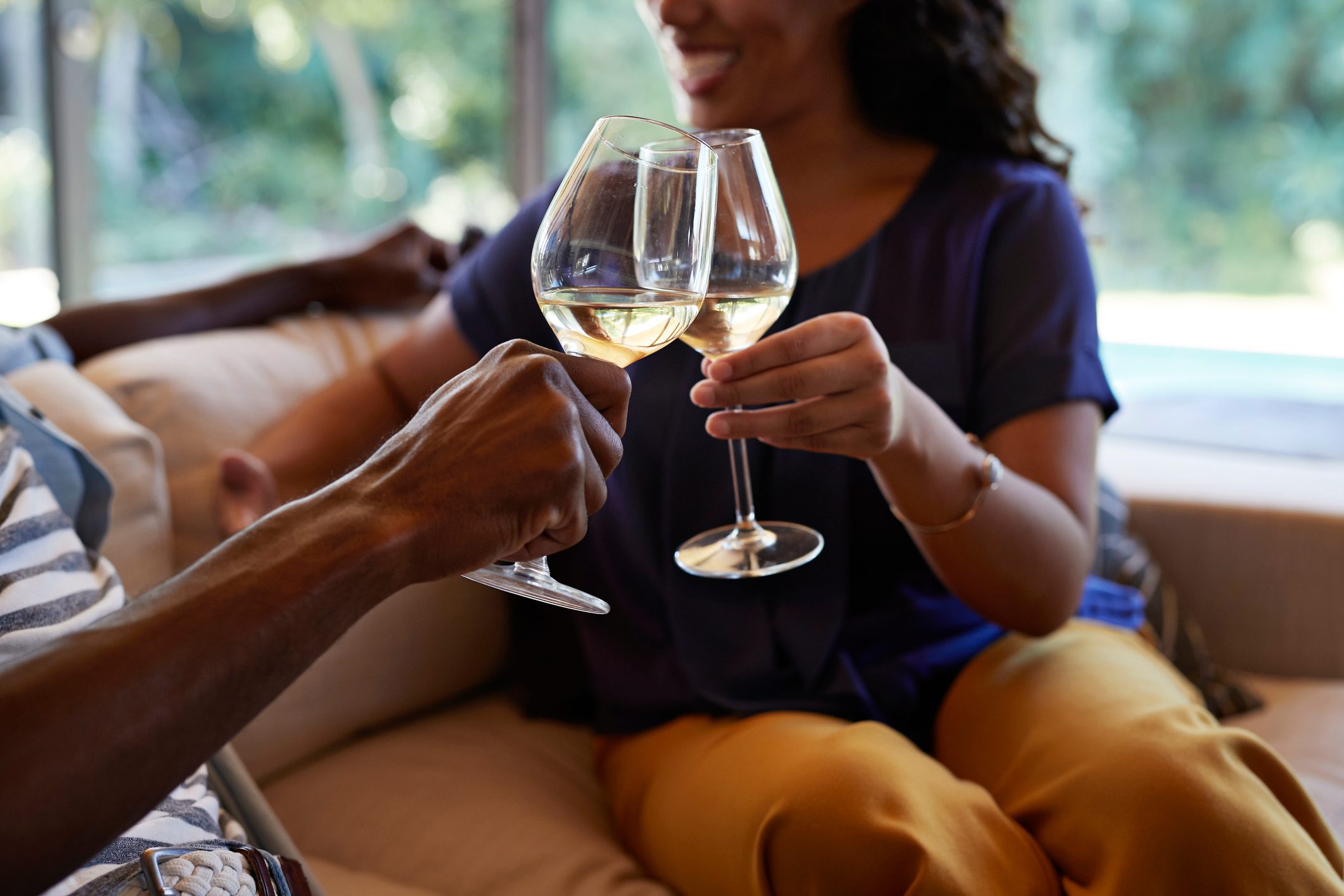 Couple toasting in wine