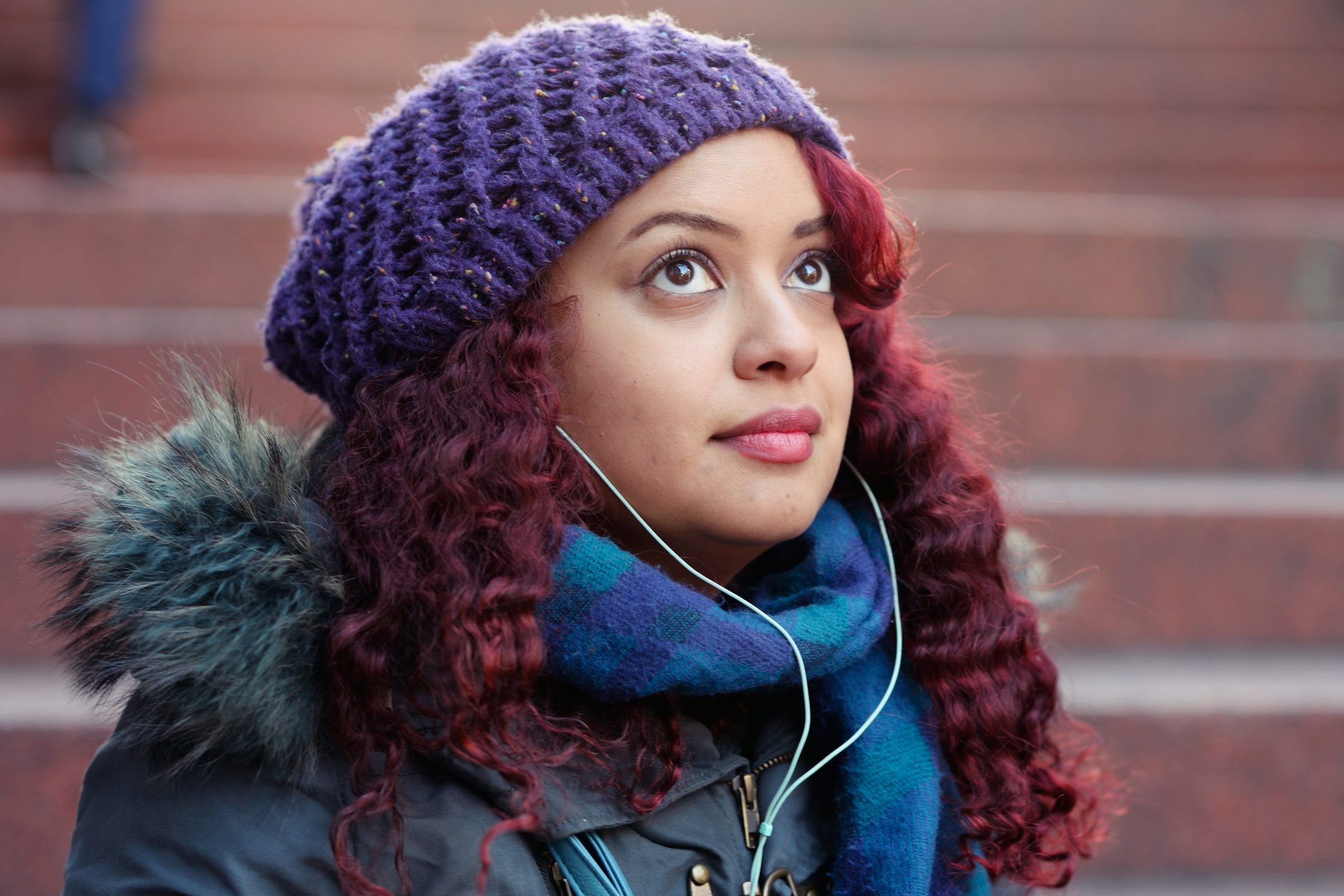 Young woman listening to music