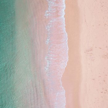 Sea, waves and pink sand