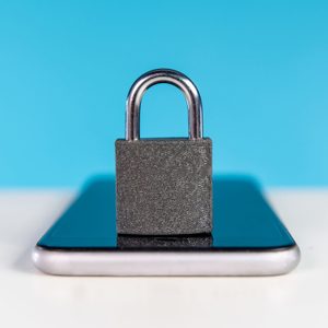 Locked padlock on mobile phone