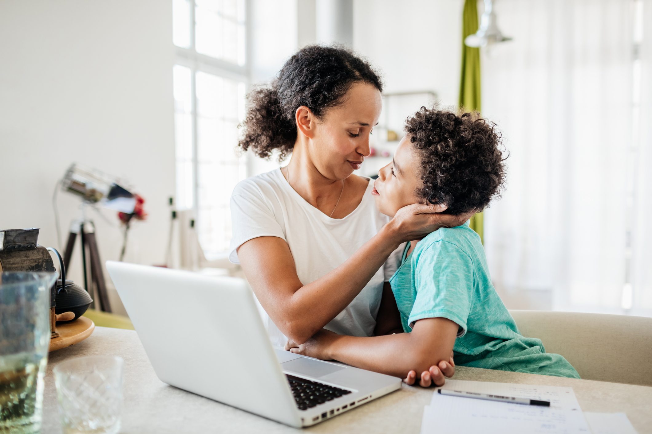 Single Mom Being Affectionate With Young Son