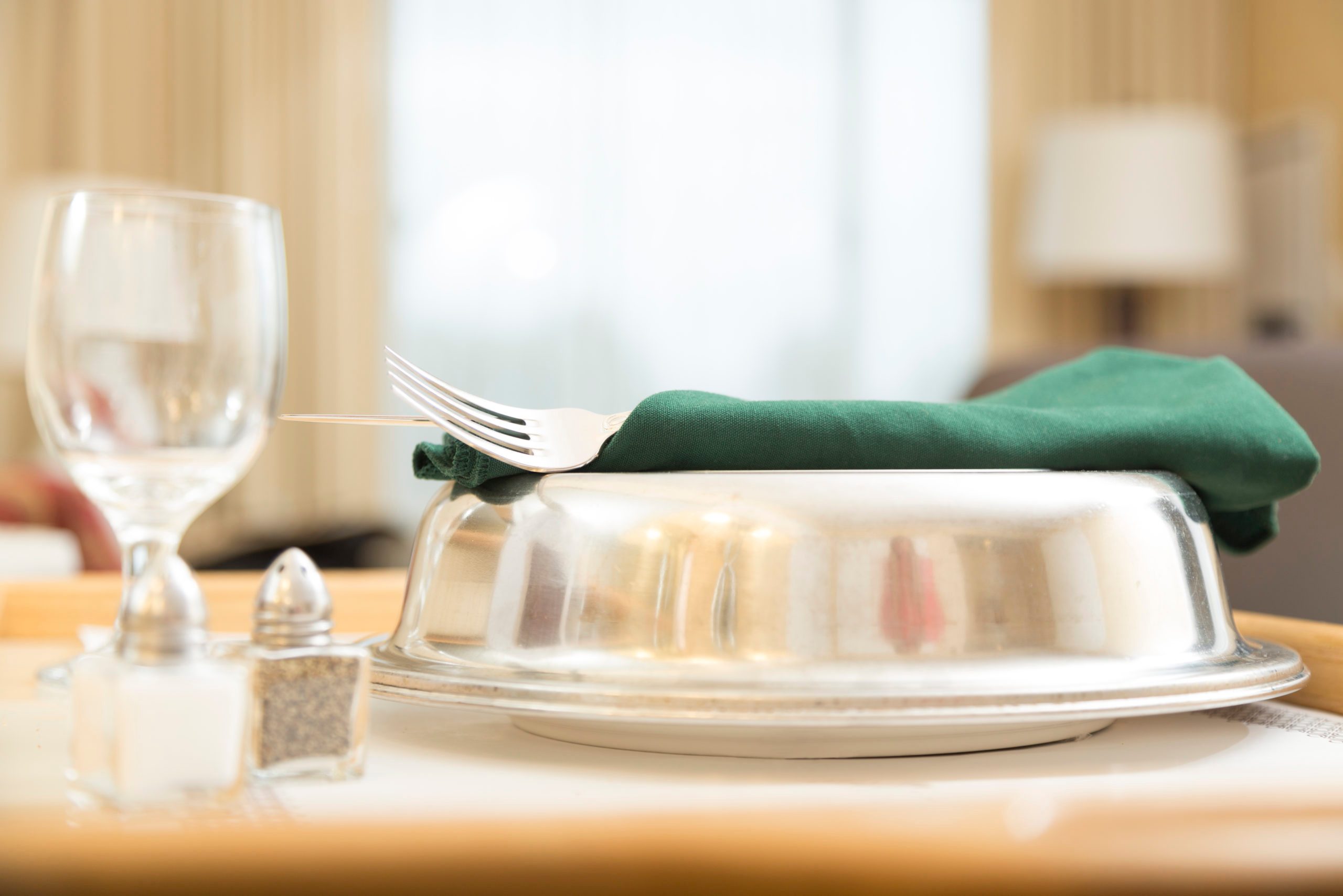 Traveling: Room service delivered in a hotel suite.