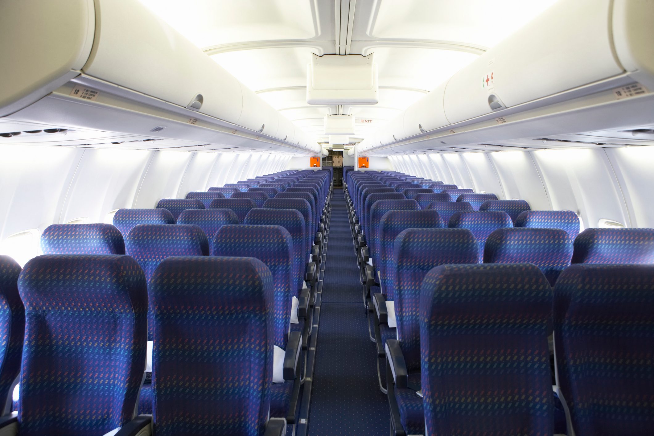 Rows of empty seats on airplane