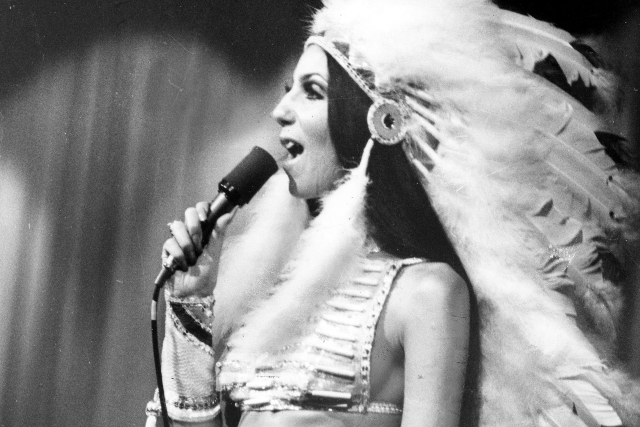 cher on stage in native american outfit